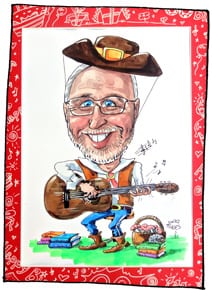 Foto von einer farbenfrohen Portraitzeichnung von einem Gitarrenspieler als Geschenkidee für Geburtstag oder Jubliäum.